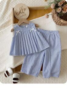 Bộ đồ bé gái dễ thương cho kỳ nghỉ hè, gồm áo hai dây kẻ sọc xanh trắng và quần ống rộng cạp chun có dây rút. - Màu xanh lam - Xem 1