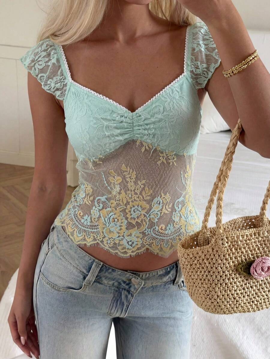 CovetEZ Camiseta sexy y versátil para una cita nocturna con parches de encaje y volantes para mujer - Amarillo - Ver 1