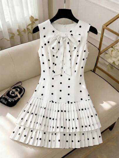 GlowEve 女士圆领波点无袖荷叶边下摆蝴蝶结腰带短连衣裙，优雅精致，适合春夏穿着