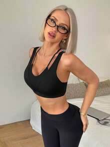 Slayform Sujetador deportivo para mujer Slayoga - unicolor y diseño sexy, con soporte y estética, almohadillas extraíbles - Adecuado para actividades al aire libre/yoga/entrenamiento/fitness/danza - Negro - Ver 3