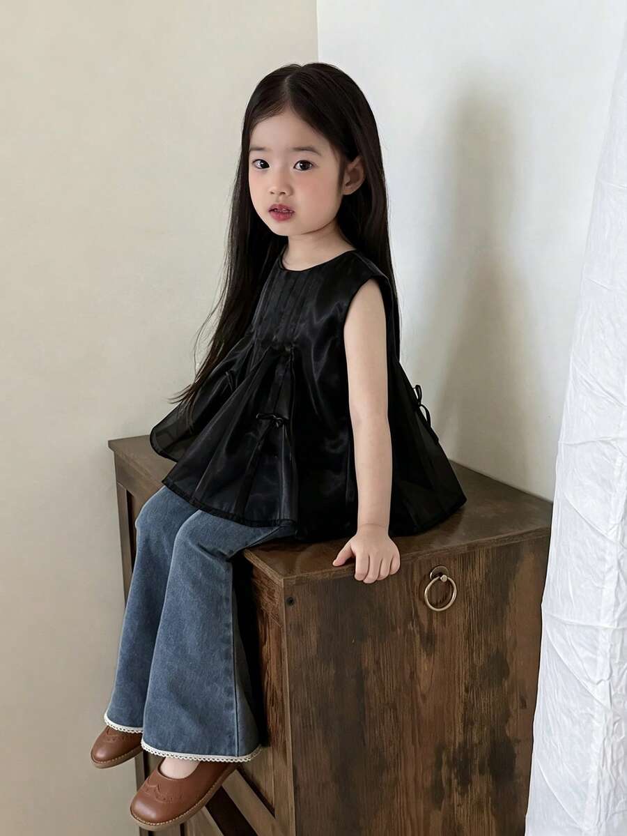 DAZY Blusa sin mangas con cuello redondo y decoración de lazo para niñas pequeñas, estilo coreano fresco de verano para niños pequeños - Negro - Ver 1