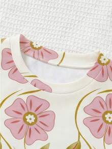 1 chiếc áo thun dệt kim tay ngắn cổ tròn in hoa dáng casual cho bé gái tuổi teen, thích hợp cho kỳ nghỉ biển, trang phục mùa hè, xu hướng thời trang Xuân Hè 2026 mới. - Nhiều màu - Xem 4