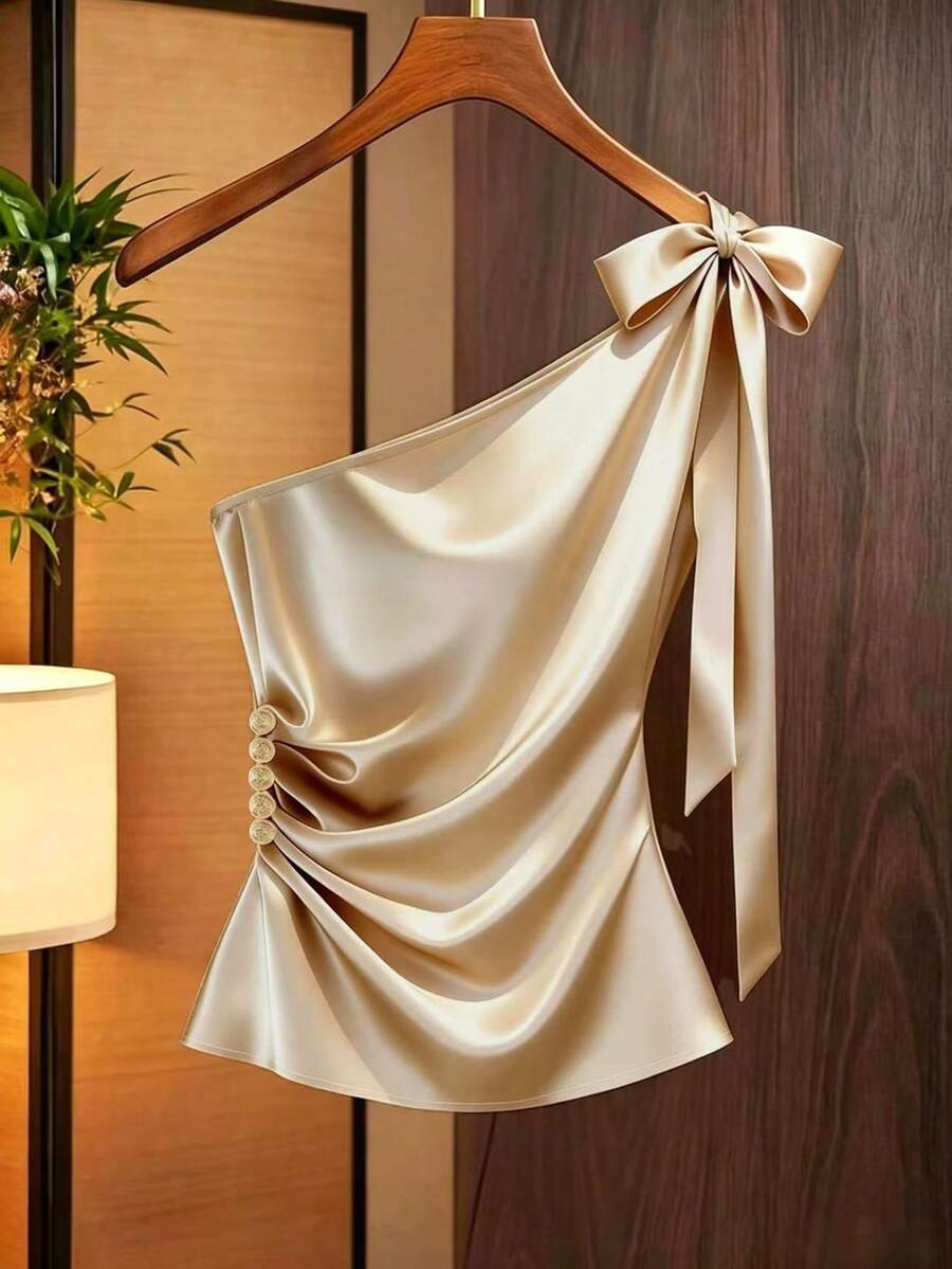 Franclia Áo nữ màu sâm panh bóng mượt, thiết kế lệch vai, thắt nơ eo và cài nút, thích hợp cho các dịp thường ngày, đi nghỉ mát, lễ hội, dự tiệc hoặc các sự kiện trang trọng. - Màu be - Xem 1