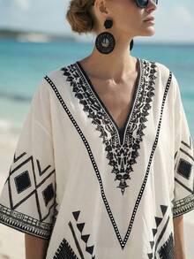 SHEIN Holidaya Đầm midi nữ mới năm 2026 với thiết kế xẻ tà in họa tiết, in kỹ thuật số, đầm đi biển thường ngày, thanh lịch, đa năng, cổ chữ V, dáng hình thoi, tay ngắn, đầm thường ngày cho nữ mùa hè, đầm tunic nữ, đầm tunic cho nữ, đầm nghỉ dưỡng cho nữ, trang phục đi nghỉ mát, trang phục nghỉ dưỡng cho nữ, trang phục phong cách nghỉ dưỡng, trang phục mùa xuân cho nữ, đầm mới về, đầm suông thường ngày cho mùa hè. - Nhiều màu - Xem 7