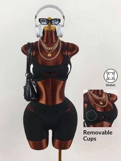 Amplova Bộ đồ thể thao nữ gồm áo tank top ngắn màu trơn và quần short phối lưới.