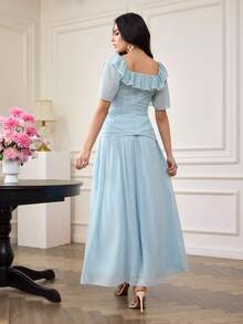 Modelyn Bộ đồ 2 món dành cho nữ: Áo kiểu cổ vuông tay bồng và chân váy voan màu xanh nhạt, thích hợp cho mùa xuân/hè. - Màu xanh lam - Xem 2