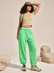 Exploreva Pantalones jogger para mujer con cintura elástica, bolsillos en diagonal y ribete de contraste - Verde - Ver 3