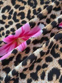 SHEIN Bộ bikini họa tiết hoa và da báo dành cho thiếu nữ, đồ bơi dệt kim ôm sát, thoải mái, năng động, có bèo nhún, bộ đồ bơi 2 mảnh họa tiết hoa cho kỳ nghỉ biển, đồ bơi một mảnh họa tiết da báo, đồ bơi in hoa và da báo, bộ đồ bơi in họa tiết da báo, đồ bơi một mảnh họa tiết da báo, đồ bơi in họa tiết động vật, đồ bơi một mảnh in họa tiết da báo đốm. - Nhiều màu - Xem 4