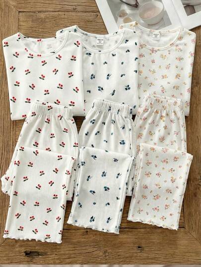 SHEIN Bộ đồ ngủ cho bé gái tuổi teen, kiểu dáng tối giản với áo cổ tròn tay ngắn họa tiết hoa nhí và quần dài mềm mại, thoải mái với gấu quần xếp ly, 2 món.