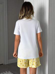SHEIN Bộ 3 món gồm áo thun ngắn tay cổ tròn họa tiết nơ, quần short và quần dài kẻ sọc in hình chanh, kiểu dáng thoải mái, dễ thương và dễ thương dành cho nữ, hiệu Cotton Line Plus Size Women. - Màu be - Xem 2