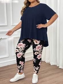 SHEIN CURVE+ Bộ đồ nữ cỡ lớn mùa hè gồm áo thun cổ tròn tay ngắn màu trơn vạt lệch và quần dài in hoa, thích hợp cho kỳ nghỉ hè/quê hương/bãi biển/trang phục đi biển. - Màu xanh hải quân - Xem 10