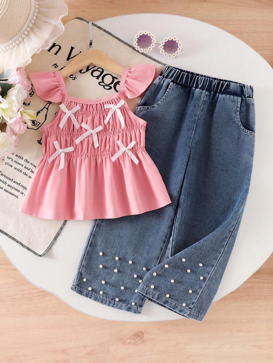 Bộ đồ hè 2 món cho bé gái (cỡ nhỏ): Áo hai dây màu hồng tay bồng có nơ, quần jean ống đứng có túi và viền ngọc trai, phong cách thường ngày, đi nghỉ mát, dạo chơi, ngọt ngào. - Hồng - Xem 1