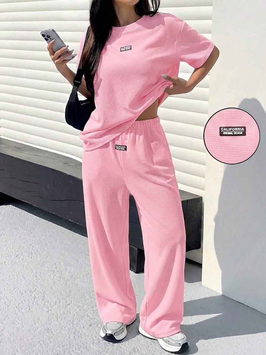 Muchica Light Pink Textured Casual Loose T-Shirt And Pants Set For Women - Baby Pink - View 1