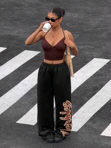 Muchica Quần thể thao nữ họa tiết da báo - màu đen - Xem 3