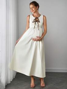 SHEIN 米色底棕色滚边孕妇连衣裙，系带腰身，无袖圆领，简约优雅，后背蝴蝶结系带，收腰设计修饰腹部，温柔婉约，适合孕期通勤穿着。 - 米色 - 查看 5