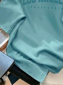 SHEIN EZwear 超大款3D立体压纹英文标语图案圆领短袖宽松T恤，女士休闲套头衫，适合春夏穿着 - 薄荷綠 - 查看 3