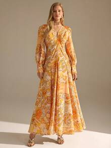 CLARA VERO Đầm maxi tay phồng họa tiết trừu tượng phong cách Boho, dáng rộng tạo nên vẻ ngoài thướt tha, hoàn hảo cho kỳ nghỉ biển, tiệc vườn hoặc các sự kiện mùa hè. Được làm từ chất liệu polyester 100% màu cam nhẹ, không co giãn, mang lại sự thoải mái thoáng khí và vẻ thanh lịch tự nhiên. - Nhiều màu - Xem 4