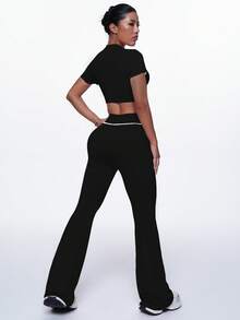 Dewbera Conjunto de camiseta corta y pantalones acampanados con ribete de contraste, estilo deportivo casual para mujer - Negro - Ver 2