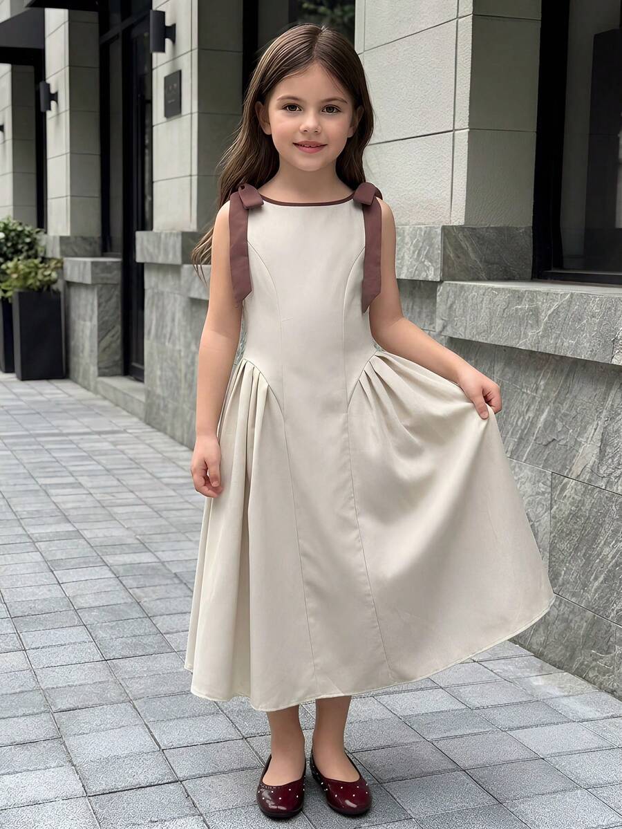 Firerie Kids Firerie Kids 女童蝴蝶结装饰撞色中长连衣裙,卡其色,休闲日常穿着,通勤,时尚百搭,适合外出、节日、聚会、拍照等场合。 - 杏色 - 查看 1