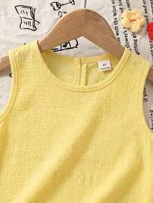 SHEIN Bộ 2 món áo không tay họa tiết hoa nhí và quần ống rộng thoải mái cho bé gái, bộ đồ hai mảnh cho bé gái, bộ đồ hoa cho bé gái, bộ đồ hai mảnh cho bé gái, bộ đồ hoa cho trẻ em, quần áo trẻ em, bộ váy cho bé gái, quần áo trẻ em kiểu cổ điển, bộ váy cho bé gái, bộ váy in hoa, áo nơ cho bé gái, bộ váy hoa, bộ áo nơ cho bé gái, bộ đồ phối hợp cho bé gái, bộ váy cho bé gái, bộ quần áo bé gái, bộ váy hoa, bộ 2 món áo nơ và váy cho bé gái, bộ đồ chị em gái, áo nơ cho bé gái. - Màu vàng - Xem 6
