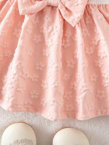 Loomiva Newborn Baby Girl Contrast Color Bow Soft Round Neck Ruffle Hem Cinched Waist Dress - Multicolor - View 7