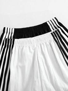 SHEIN 两件套短裤，侧边饰有四条白色条纹，经典时尚的绿色和粉色，鲜艳的色彩非常适合外出和旅行。 - 彩色 - 查看 4