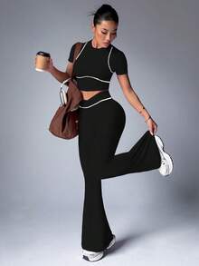 Dewbera Conjunto de camiseta corta y pantalones acampanados con ribete de contraste, estilo deportivo casual para mujer - Negro - Ver 5