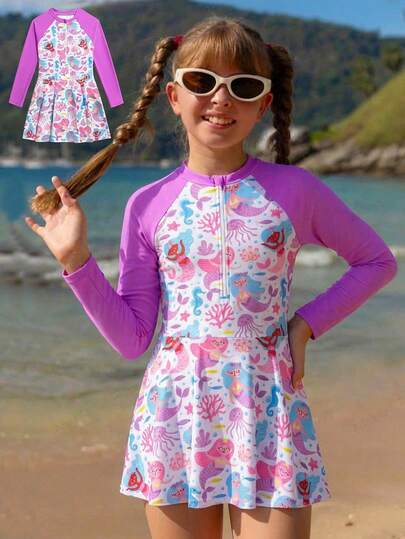 Áo tắm liền thân tay raglan phối họa tiết hoạt hình cho bé gái tuổi teen, kiểu dáng nửa khóa kéo phía trước, phong cách đi biển/nghỉ dưỡng.