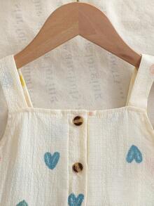 SHEIN Genkimix Kids Conjunto de 2 piezas de estilo europeo y americano para niñas en verano, con top de tirantes con estampado de corazones + pantalones de pierna ancha, de tela de algodón con textura de burbujas, suave y agradable a la piel, apropiado para niñas de 4 a 7 años, adecuado para jugar al aire libre - Albaricoque - Ver 8