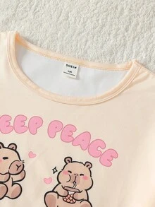 SHEIN GraphicGems 两件套女童家居服，圆领短袖短裤，夏季清新淡雅的黄色和浅蓝色可爱卡通动物水豚字母印花，休闲家居服，柔软针织面料，舒适透气，时尚别致，现代潮流，高品质睡衣套装，适合日常穿着。 - 彩色 - 查看 3