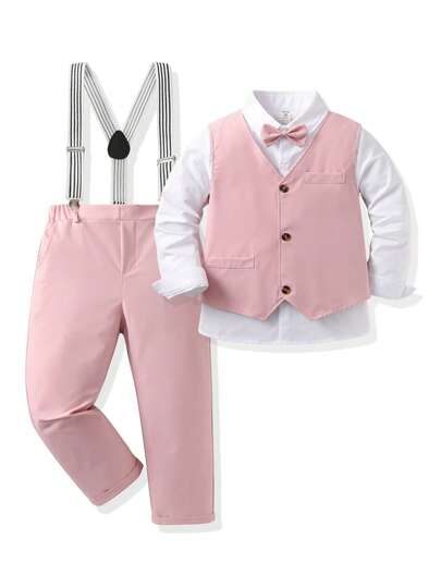 Bộ vest 3 món dành cho bé trai tuổi teen, bao gồm cà vạt nơ tinh tế, áo sơ mi cổ bẻ màu trắng tinh, áo vest màu đỏ tía và quần yếm kẻ sọc thời trang có thể điều chỉnh độ dài. Thích hợp cho các dịp trang trọng như đám cưới, tiệc tùng, Halloween, Giáng sinh, Lễ Tạ ơn, cũng như mặc hàng ngày.