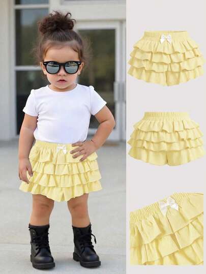 Bubblio Quần short bé gái họa tiết da báo dễ thương với viền bèo nhún, đa năng cho mùa hè.