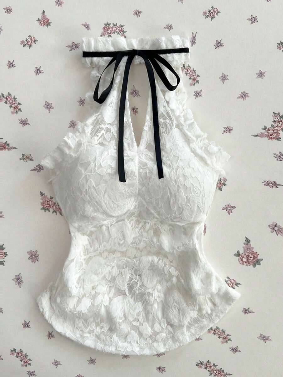 Elamini Áo dệt kim không tay họa tiết hoa jacquard dành cho nữ, kiểu dáng gợi cảm, thanh lịch, phá cách, khoét hở vai, dây buộc nơ đen, eo xếp ly, phối màu đen trắng, thích hợp cho mùa xuân, hè và thu. - trắng - Xem 1