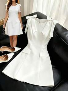 GlowEve 新款肩带蝴蝶结装饰简约通勤优雅无袖口袋连衣裙，女款 - 白色 - 查看 1