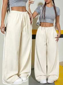 SHEIN Thời trang nữ tuổi teen phong cách thường ngày Y2K vintage cá tính đường phố, quần jean ống rộng thoải mái màu xám, cạp chun co giãn, thiết kế dây rút dành cho nữ sinh trung học. Quần áo nữ tuổi teen mềm mại, trang phục hàng ngày và trang phục mùa đông thu cho nữ sinh, trang phục dự tiệc, trang phục đường phố, quần ống rộng cho nữ. - Màu be - Xem 6
