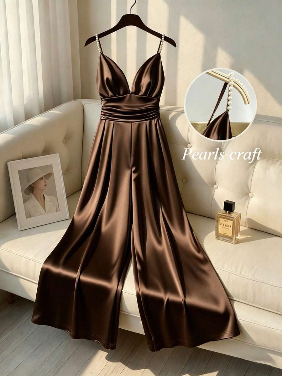 Franclia Bộ jumpsuit sang trọng màu vàng sâm panh đính đá lấp lánh, cổ chữ V, eo nhún, ống rộng, kiểu dáng thanh lịch, đa năng, giúp tôn dáng, thích hợp cho các bữa tiệc, chất liệu satin mềm mại che khuyết điểm, thiết kế dây đeo đính đá cao cấp, bộ jumpsuit màu vàng sâm panh đính đá lấp lấp lánh cổ chữ V, eo nhún, ống rộng. - màu nâu - Xem 1