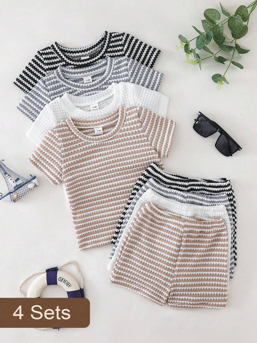 SHEIN Playful Pals 4 piezas Conjunto de ropa para bebé niño, que incluye 4 tops de manga corta de cuello redondo con textura de punto y 4 pantalones cortos de punto con cintura elástica a juego. Los colores de los tops son caqui blanco, gris oscuro blanco, gris blanco y beige blanco, con los pantalones cortos a juego con los correspondientes colores de los tops. Adecuado para primavera/verano, actividades al aire libre, uso casual, apto para bebé niño de 6 meses a 2-3 años - Multicolor - Ver 1