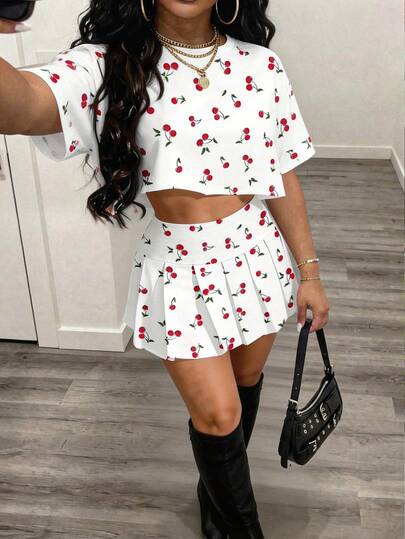 Slaydiva Conjunto deportivo y casual minimalista básico 2024, de 2 piezas: Camiseta de manga corta holgada de cuello redondo y falda mini plisada de cintura alta con estampado cruzado, en punto blanco