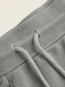 SHEIN BASICS Quần short thể thao cạp thấp thoải mái có xẻ tà, quần short mặc nhà thường ngày cho mùa xuân/hè. - Màu Xám nhạt - Xem 9