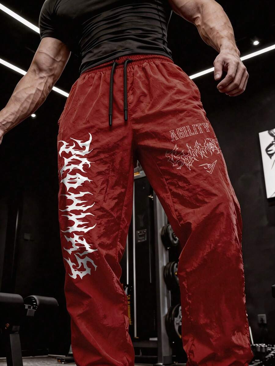 GymBeat Quần nỉ nam dáng rộng, in chữ và họa tiết, cạp chun, có dây rút. - Đỏ - Xem 1