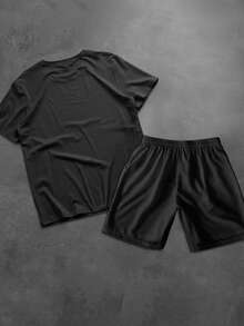 Manfinity Homme Bộ 2 món gồm áo và quần short nam cổ tròn in họa tiết tối giản. - màu đen - Xem 3