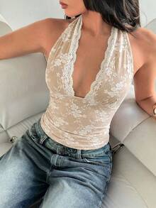 Aloruh Sexig och mångsidig blus med spetsdetaljer och halterneck för dejter och utflykter. - Vitt - Visa 5