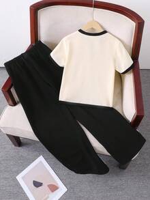 SHEIN Bộ đồ 2 món cho bé gái tuổi teen: áo ngắn tay cổ chữ V phối màu tương phản và quần dài kiểu dáng thường ngày. - Màu be - Xem 2