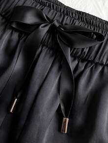 GlowEve CURVE Pantalones casuales de talla grande para mujer de unicolor con cintura elástica y cintura con lazo - Negro - Ver 4