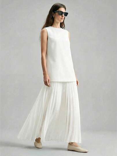 Ontre Đầm không tay mới mùa Xuân/Hè 2026 với chân váy xếp ly xòe bằng chiffon, phù hợp cho các bữa tiệc thành thị hiện đại, mùa tựu trường, phong cách bohemian thường ngày, kỳ nghỉ, lễ hội, mùa xuân. Lý tưởng cho ngày Valentine, trang phục lễ hội, trang phục đi biển và dự tiệc thanh lịch dành cho nữ.