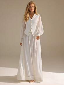 CLARA VERO 深V领纽扣前襟背心和泡泡袖衬衫套装，修身阔腿长裤，完美适合晚宴或正式场合。采用轻盈的缎面和欧根纱涤纶面料制成，具有优雅的垂坠廓形和吸睛的袖子设计。 - 白色 - 查看 5