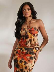 Opulessa Bộ đồ du lịch gồm áo hai mảnh: áo cổ yếm và chân váy ngắn bằng vải lưới in họa tiết dành cho nữ. - Nhiều màu - Xem 2