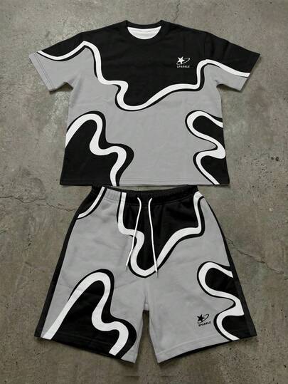 Manfinity EMRG Men's Summer Streetwear Black Grey And White Abstract Wavy Line Swirl Organic Pattern Color Block Star Logo Graphic Print Crew Neck Short Sleeve T-Shirt And Drawstring Shorts 2 Piece Matching Co-Ord Set, Y2K Futuristic Urban Sporty Athleisure Athletic Vintage Retro Rave Concert Club Festival Coachella Party Workout Going Out Casual Oversized Relaxed Fit Breathable Lightweight Maximalist Bold OOTD Outfit
