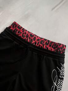 STYNVO Herren Sommer Lässig Modische Street Leoparden Muster Patchwork Kordelzug Taille Buchstaben Muster Loose Shorts - Schwarz - Übersicht 5