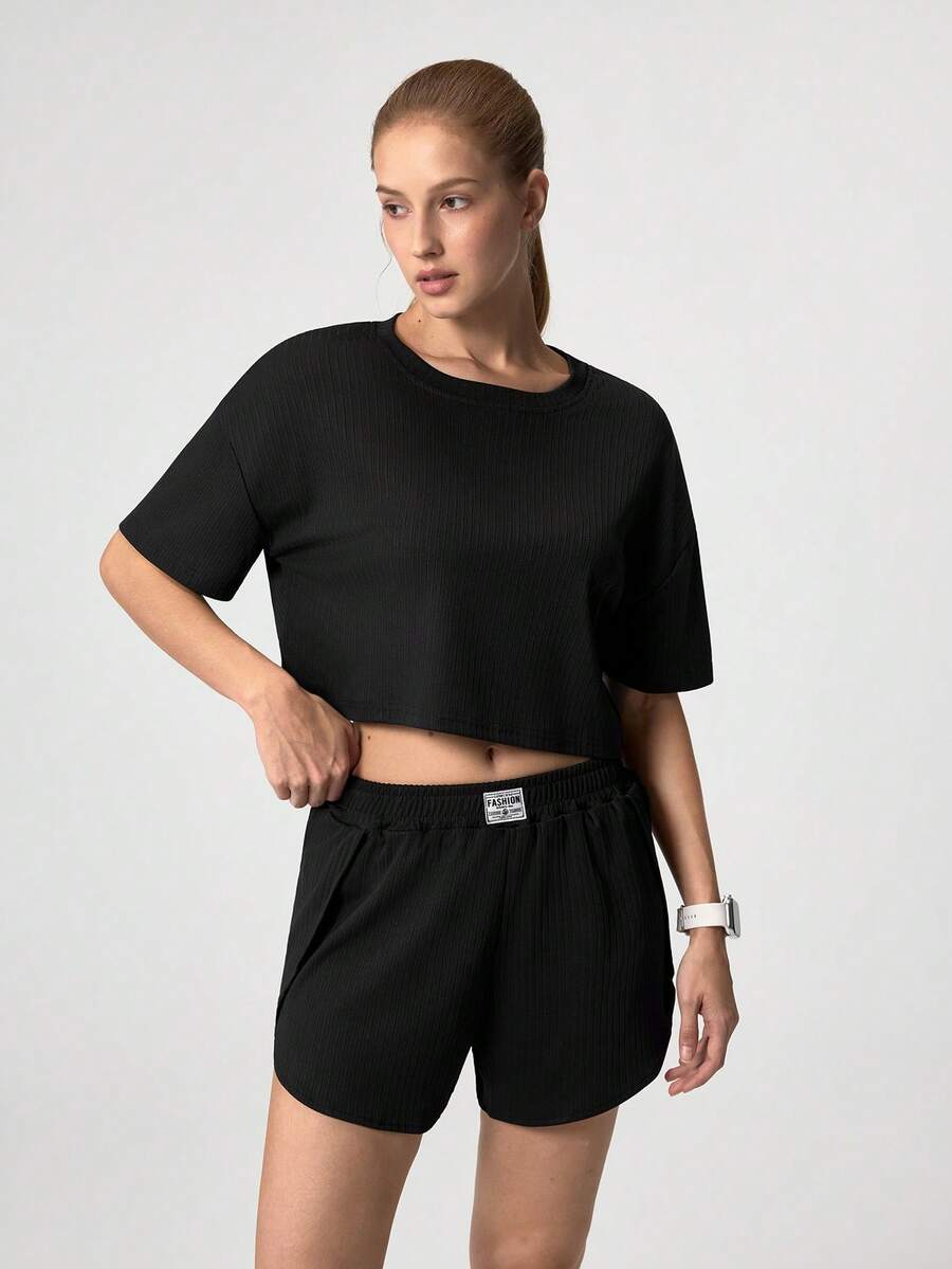 LOUNGEISTA 女士纯色华夫格针织休闲家居服两件套，落肩短袖圆领露背露脐上衣搭配侧开衩短裤，宽松舒适，两件套，秋季服装，透气舒适 - 黑色 - 查看 1